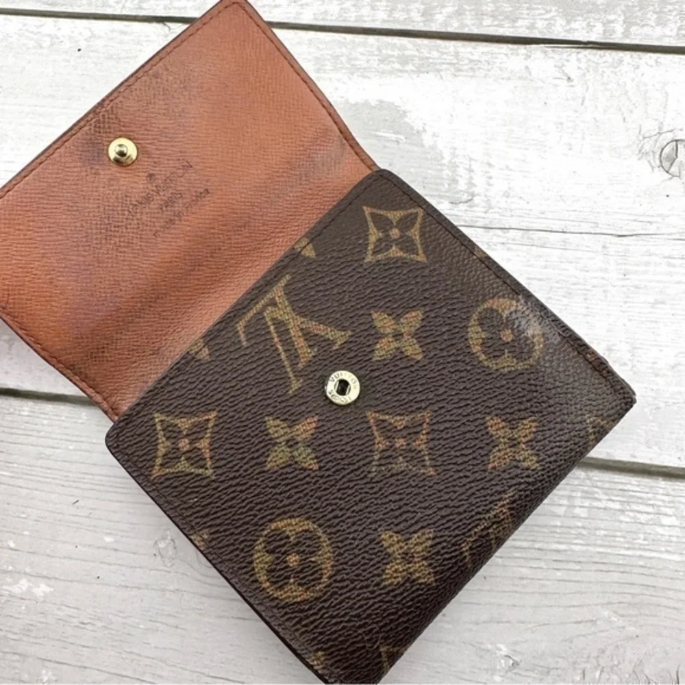 AUTHENTIC Louis Vuitton Elise compact wallet. Monogram canvas.